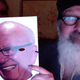 Illustration for article titled Randy Quaid returns by humping his wife while she wears Rupert Murdoch mask